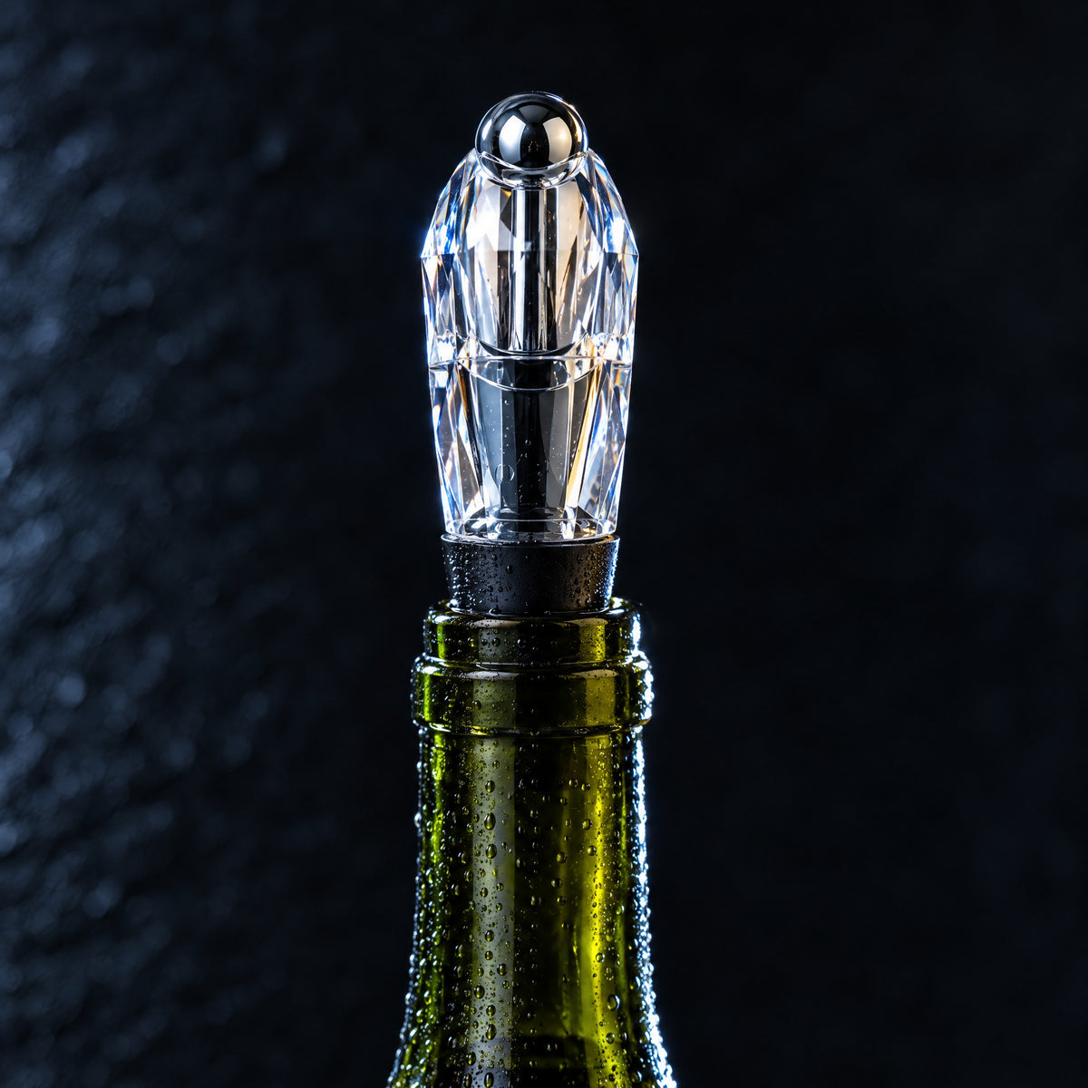 Chrome stopper sealing the bottle
