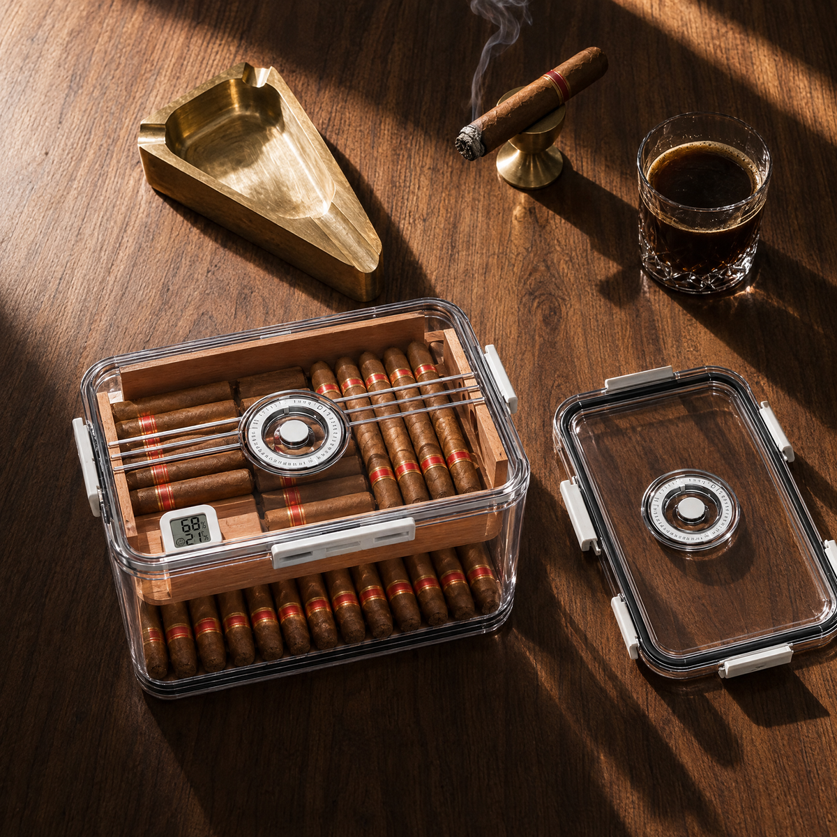 Open humidor box on a walnut table with a brass ashtray, a lit cigar and a glass of coffee in morning sun