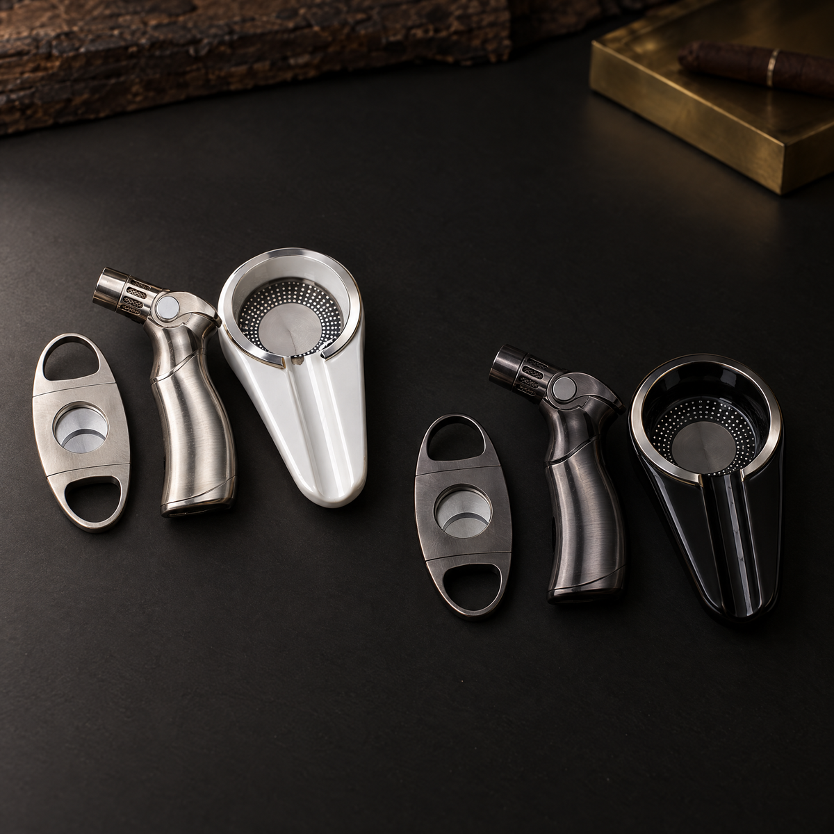 The three-piece cigar set in both colourways side by side, white and black