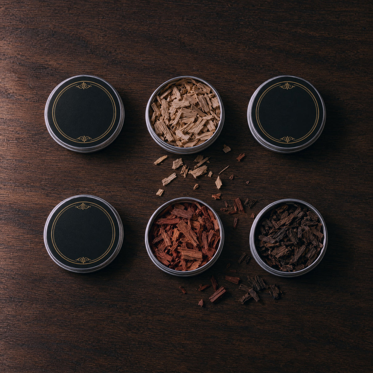 Six tins of wood chips flat lay