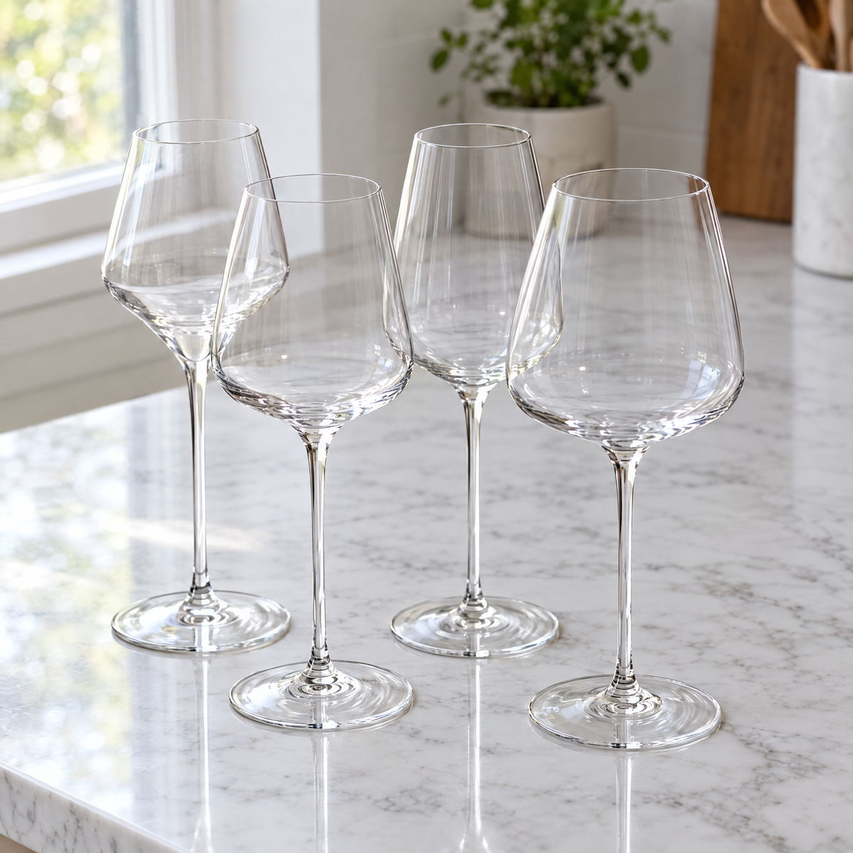 The four Bohemia Sommelier glasses on a marble counter