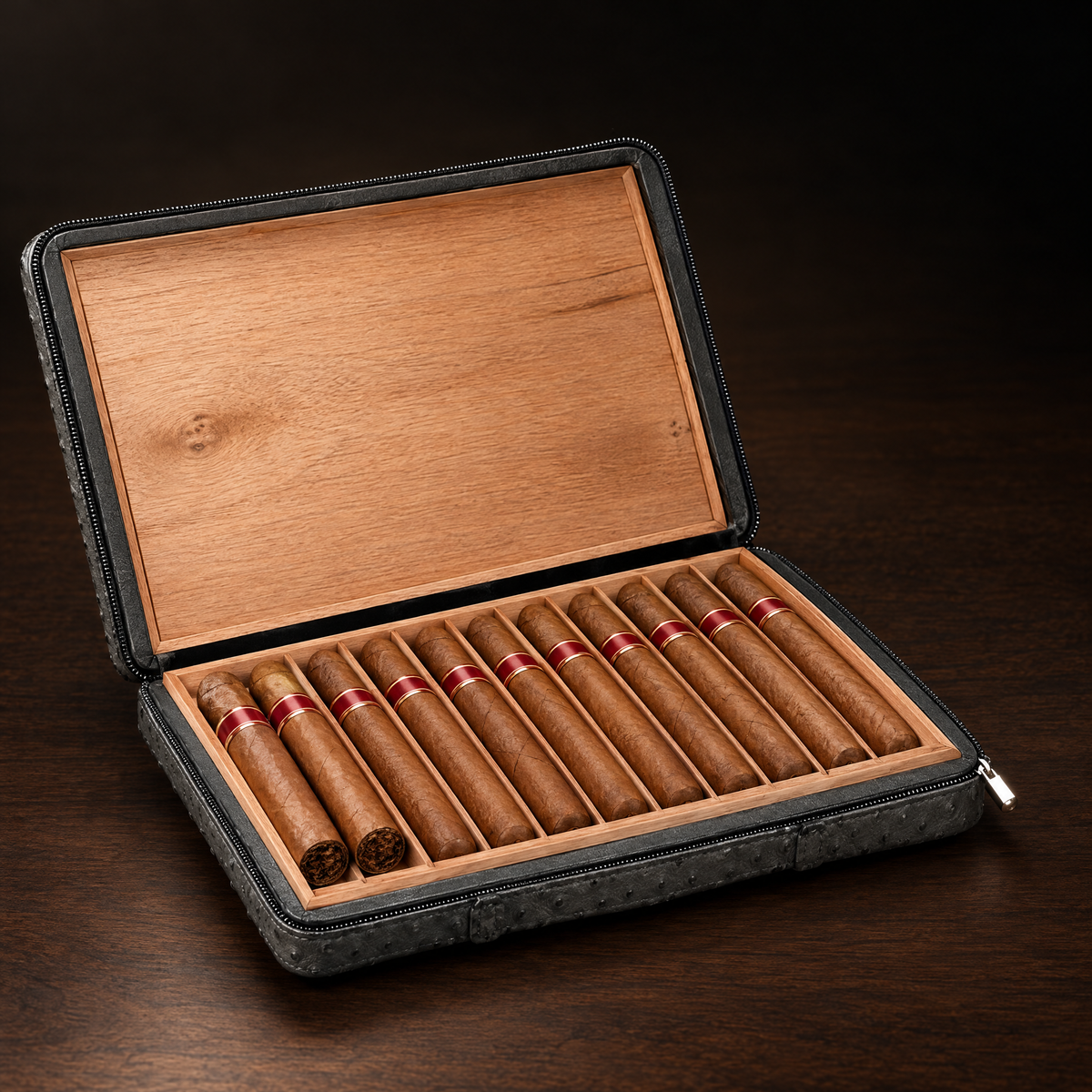 Consul Reserve ostrich-grain leather cigar case open with ten cigars in cedar channels